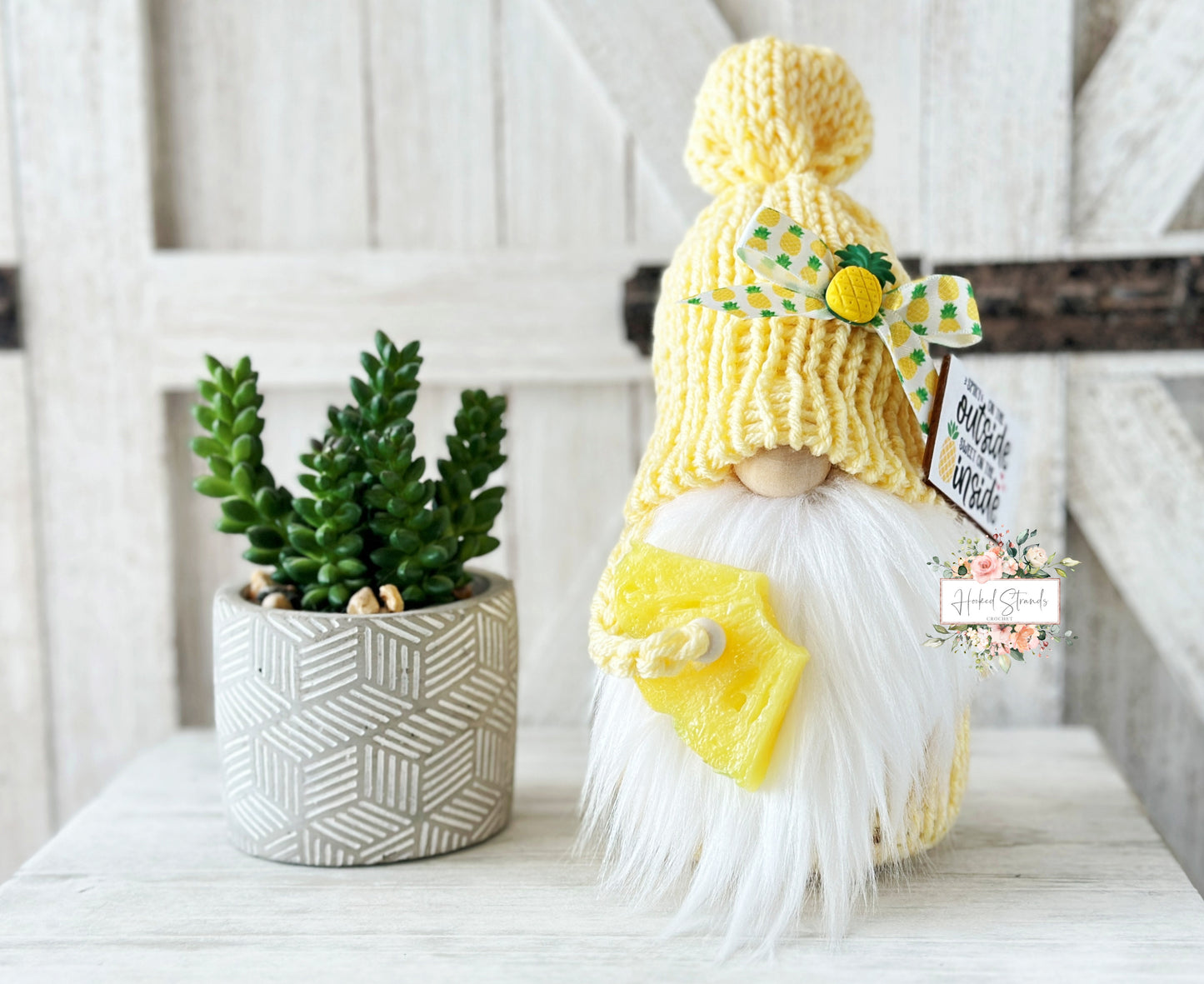 Playful yellow knit pineapple gnome with sign - tiered tray decor